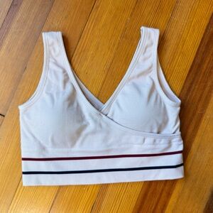 ZYIA Sports Bra (Size M) in baby pink with a maroon and navy stripe.